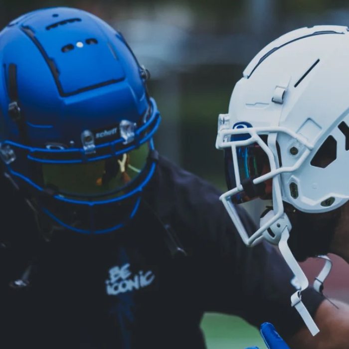 Two helmeted athletes